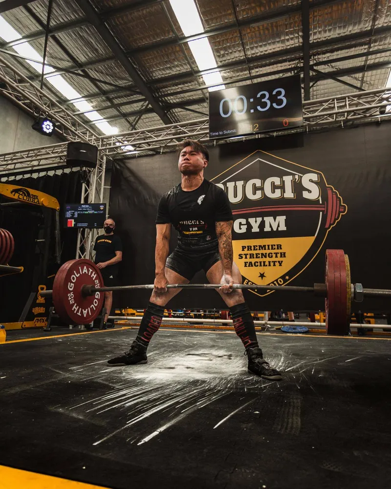 Manh pulling a 205 kg deadlift at the GPC WA State Powerlifting Championships
